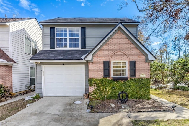 front of property with a garage