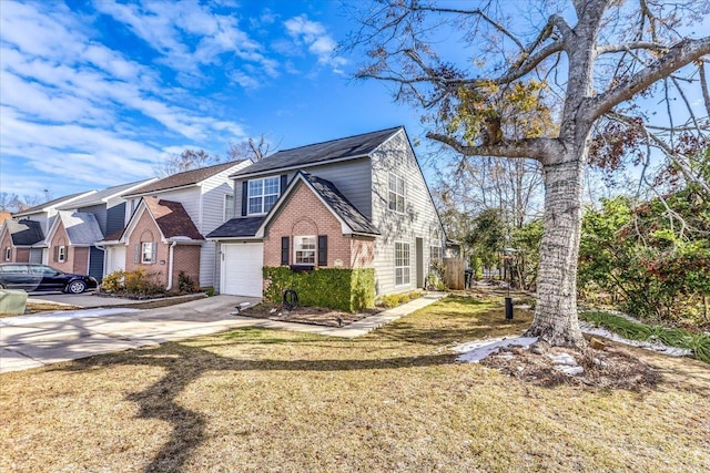 view of front property featuring a garage and a front lawn