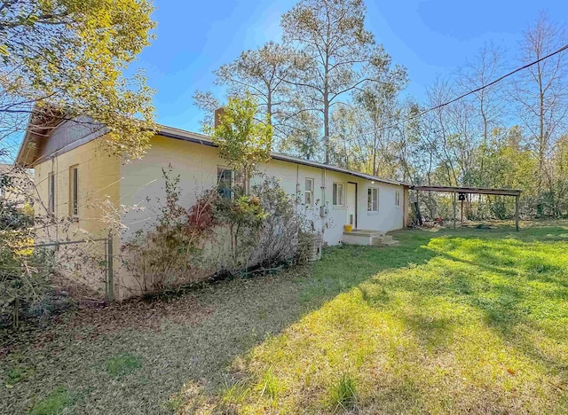 exterior space featuring a yard