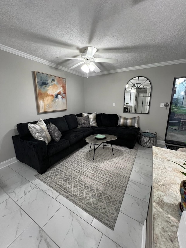 living room featuring ornamental molding, a textured ceiling, and ceiling fan