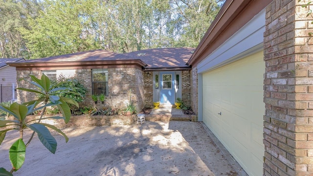 view of patio featuring a garage