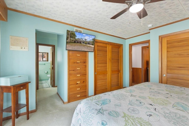 1775 N US-19 Hwy, Perry, FL 32347 - bedroom with crown molding, carpet floors, two closets, and visible vents