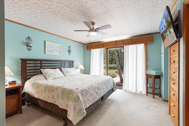 1775 N US-19 Hwy, Perry, FL 32347 - bedroom with ornamental molding, carpet, ceiling fan, and access to exterior