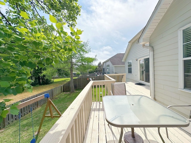 deck with outdoor dining area
