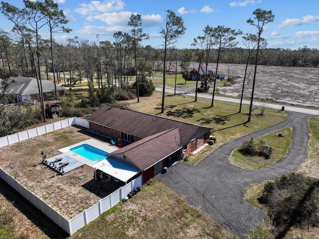 view of swimming pool featuring a fenced backyard