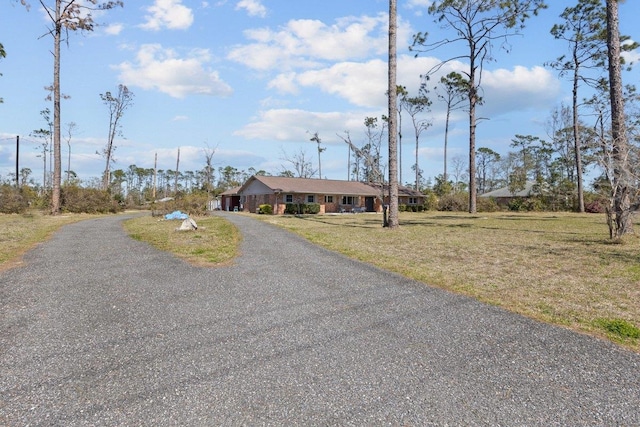 view of road with driveway