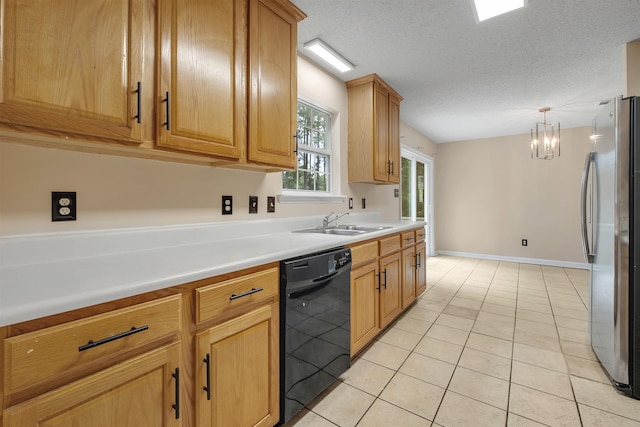 5609 Mossy Top Way, Tallahassee, FL 32303 - kitchen featuring dishwasher, freestanding refrigerator, light tile patterned floors, light countertops, and a chandelier