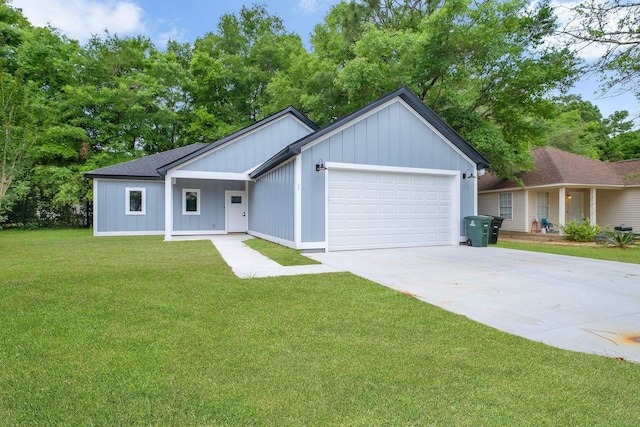 279 Ayers Ct, Tallahassee, FL 32305 - single story home featuring an attached garage, driveway, a front lawn, and board and batten siding