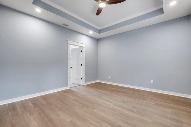 279 Ayers Ct, Tallahassee, FL 32305 - spare room with a raised ceiling, crown molding, light wood-style flooring, a ceiling fan, and recessed lighting