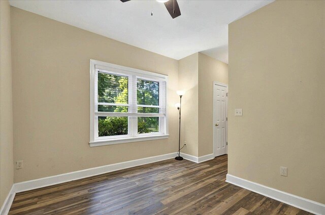 9078 Shoal Creek Dr, Tallahassee, FL 32312 - unfurnished room with ceiling fan, dark wood finished floors, and baseboards