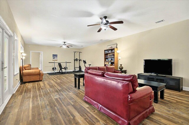9078 Shoal Creek Dr, Tallahassee, FL 32312 - living room featuring ceiling fan, wood finished floors, and baseboards