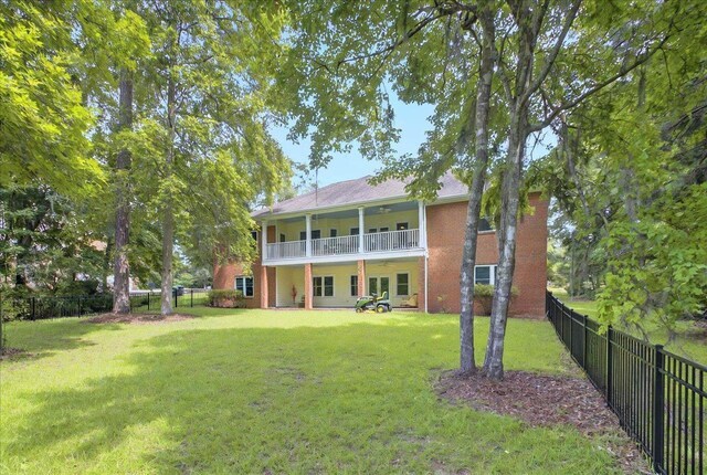 9078 Shoal Creek Dr, Tallahassee, FL 32312 - rear view of property featuring a balcony, a ceiling fan, and brick siding
