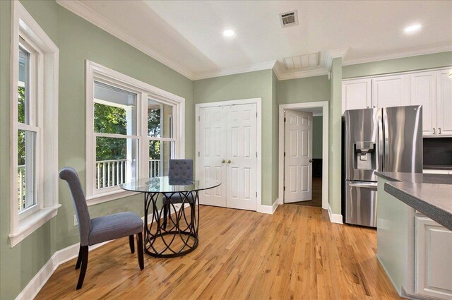 9078 Shoal Creek Dr, Tallahassee, FL 32312 - dining room featuring crown molding, light wood-type flooring, baseboards, healthy amount of natural light, and recessed lighting