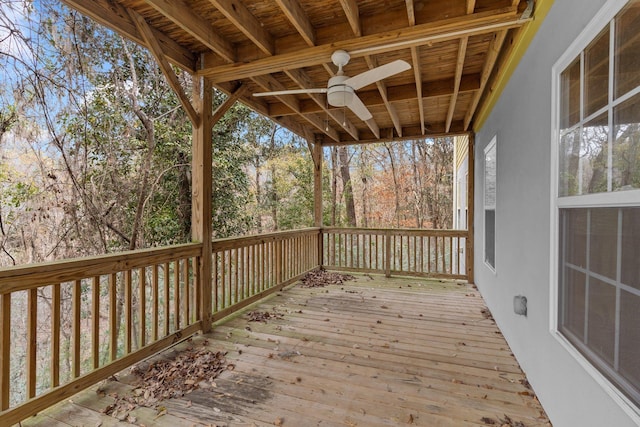 wooden terrace featuring ceiling fan