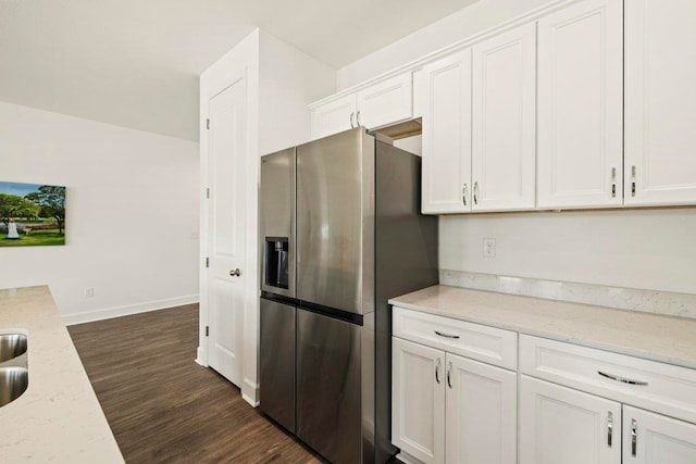 4468 River Breeze Ln, Tallahassee, FL 32303 - kitchen featuring stainless steel refrigerator with ice dispenser, dark wood-style floors, white cabinetry, baseboards, and light stone counters