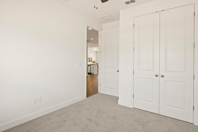 4468 River Breeze Ln, Tallahassee, FL 32303 - unfurnished bedroom with carpet, baseboards, and a closet