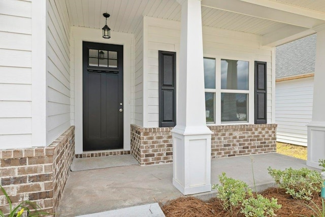 4468 River Breeze Ln, Tallahassee, FL 32303 - view of exterior entry with covered porch and brick siding