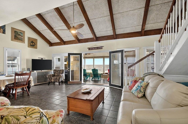 1195 Alligator Dr, Alligator Point, FL 32346 - living room with beam ceiling, stairway, high vaulted ceiling, and a ceiling fan