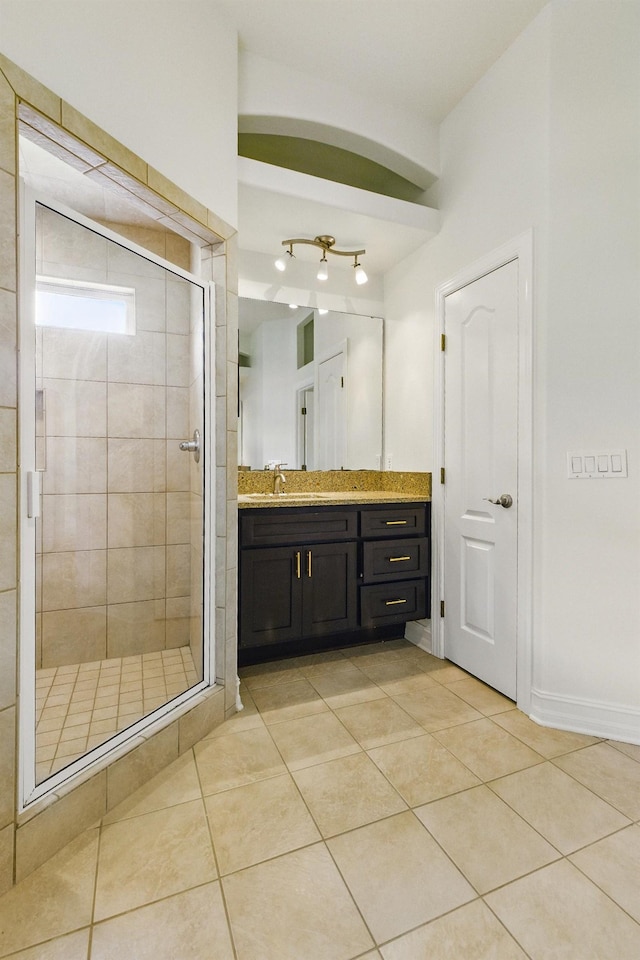 9227 Shoal Creek Dr, Tallahassee, FL 32312 - full bath featuring vanity, a stall shower, and tile patterned flooring