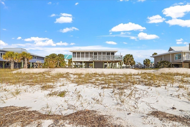 view of front of property with a sunroom