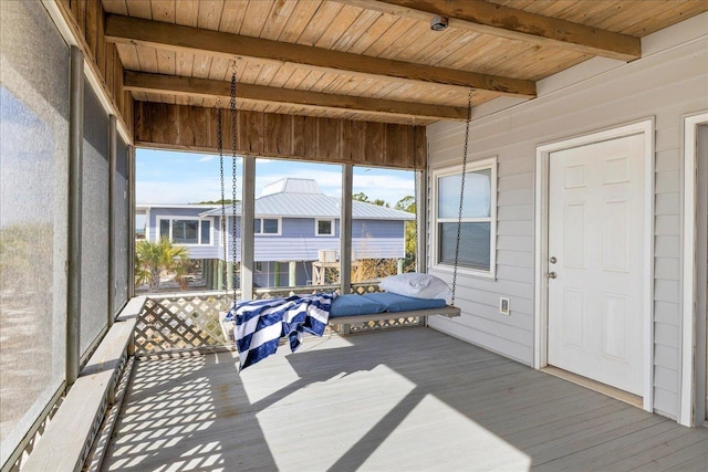 sunroom / solarium with wooden ceiling and beam ceiling