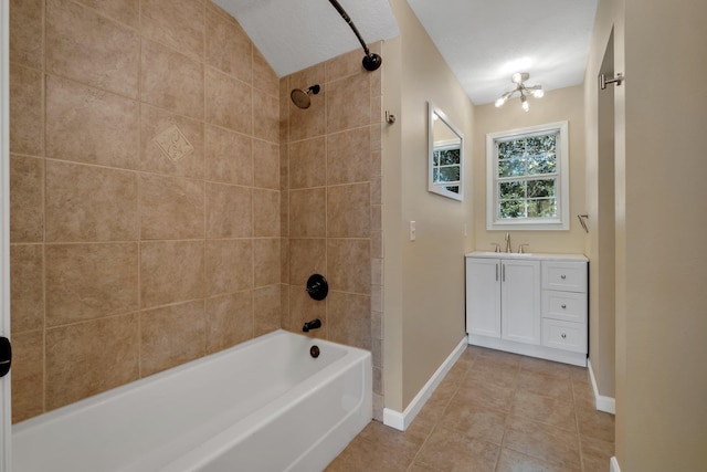 bathroom featuring baseboards, shower / washtub combination, vanity, and tile patterned floors