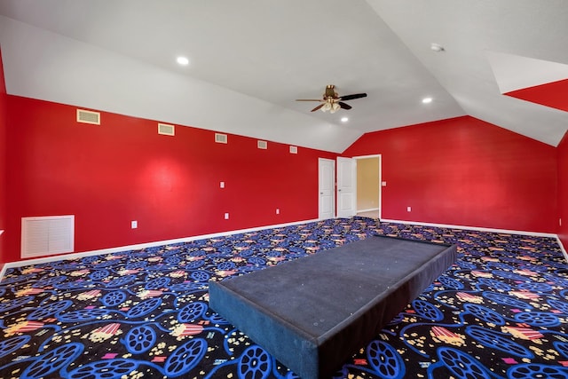 interior space with visible vents and vaulted ceiling