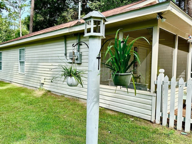 view of property exterior featuring a yard