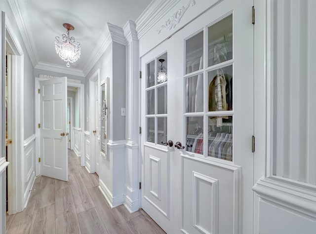2825 Turkey Hill Trl, Tallahassee, FL 32312 - interior space featuring an inviting chandelier, ornamental molding, and light wood-style floors