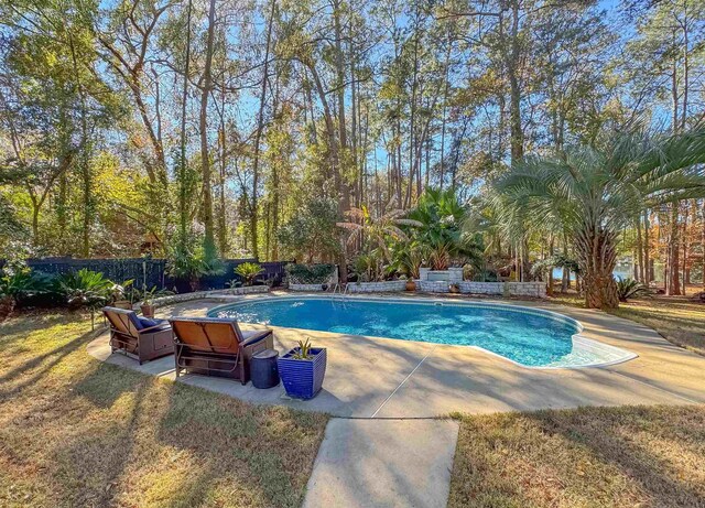 2825 Turkey Hill Trl, Tallahassee, FL 32312 - pool with a fenced backyard and a patio area