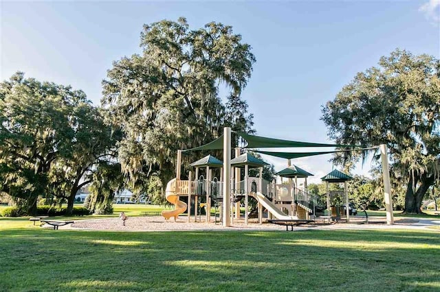 community play area with a lawn