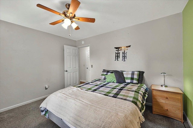 carpeted bedroom with baseboards and ceiling fan