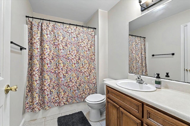 full bathroom with toilet, vanity, tile patterned floors, and a shower with shower curtain