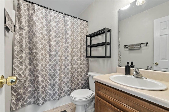 bathroom with shower / tub combo with curtain, toilet, tile patterned flooring, and vanity