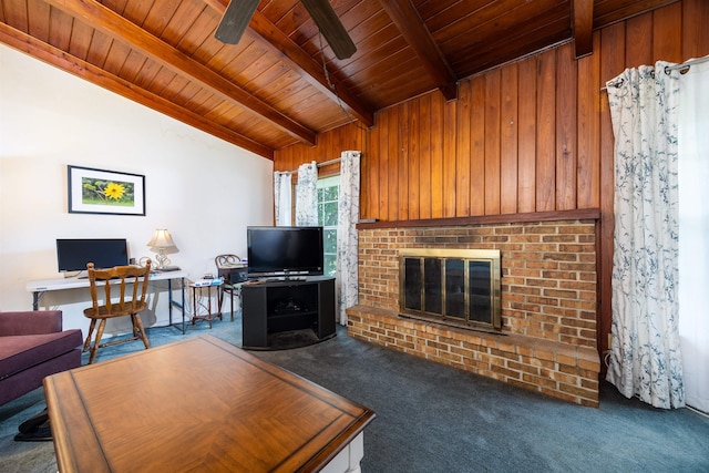 carpeted living room with wood walls, wood ceiling, lofted ceiling with beams, a brick fireplace, and ceiling fan