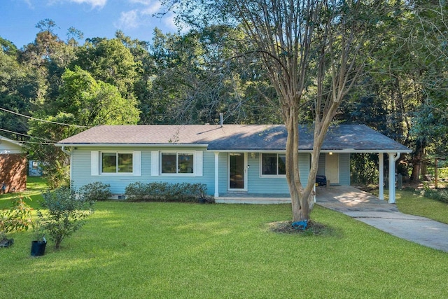 ranch-style home featuring an attached carport, a front yard, driveway, and a shingled roof