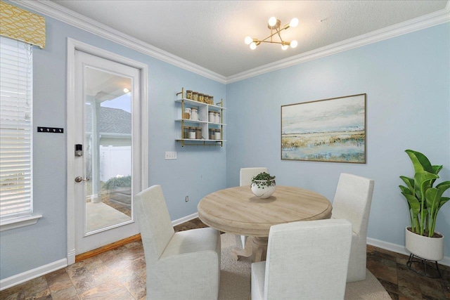 dining space featuring a chandelier and crown molding