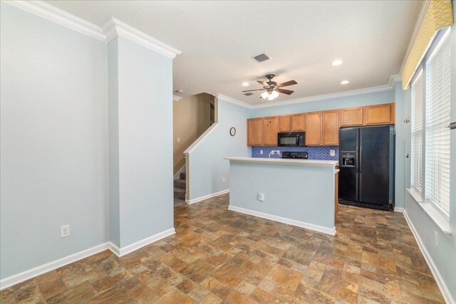 kitchen with ceiling fan, a center island, tasteful backsplash, black appliances, and ornamental molding