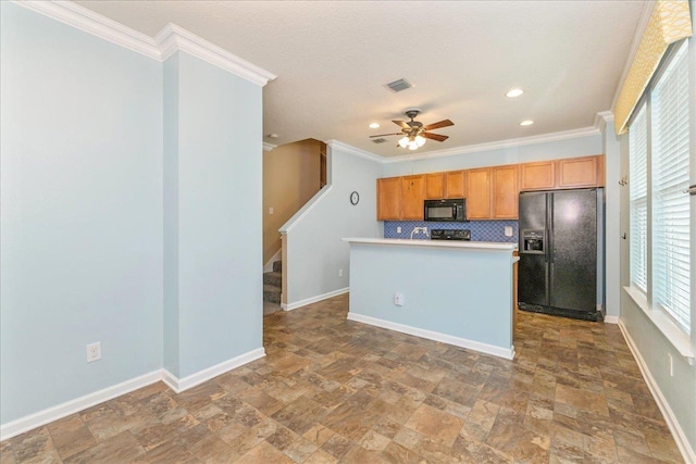 kitchen featuring ceiling fan, a center island, decorative backsplash, black appliances, and ornamental molding