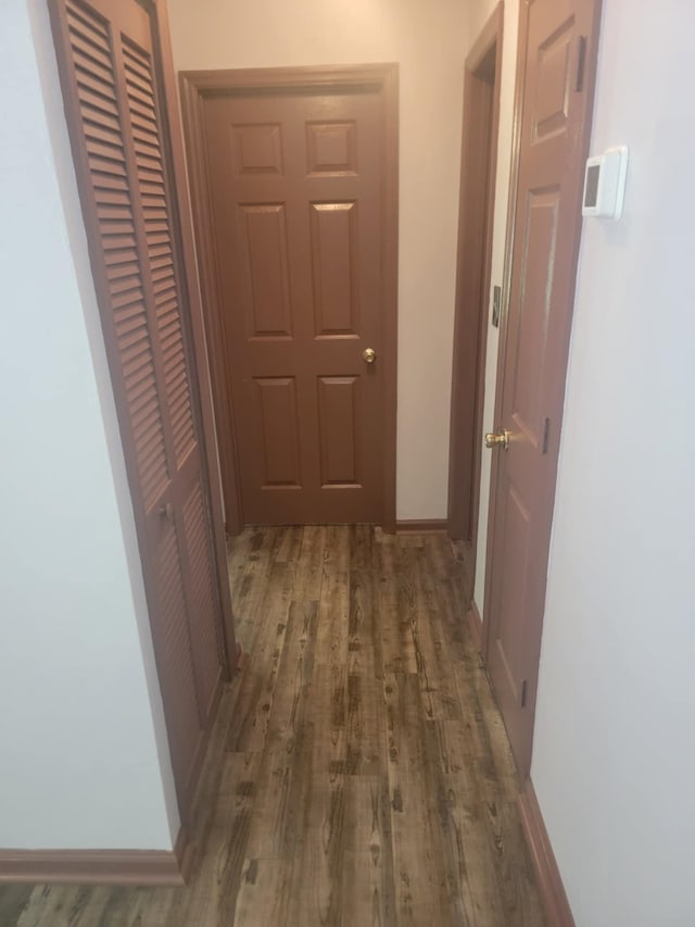 hall featuring dark hardwood / wood-style floors