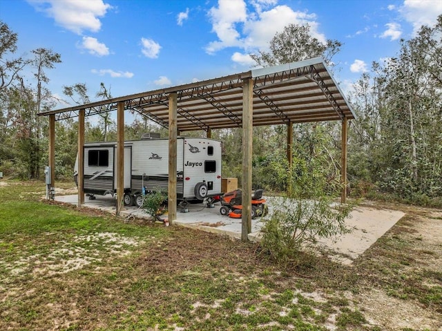 view of parking / parking lot with a carport