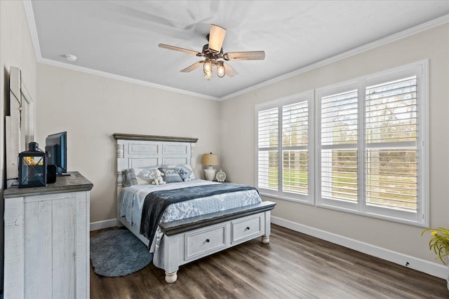 bedroom with crown molding, ceiling fan, and dark wood-type flooring