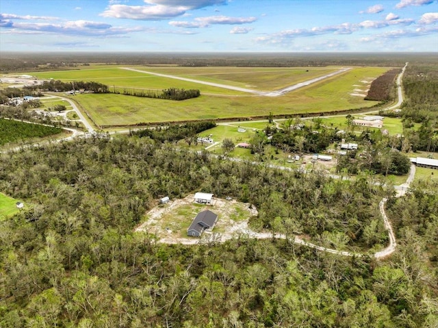 birds eye view of property featuring a rural view