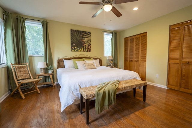 6611 Crooked Creek Rd, Tallahassee, FL 32311 - bedroom featuring wood finished floors, multiple windows, recessed lighting, two closets, and a ceiling fan