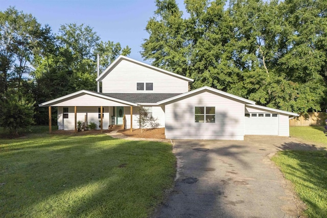 6611 Crooked Creek Rd, Tallahassee, FL 32311 - view of front facade with asphalt driveway, a front lawn, and a porch