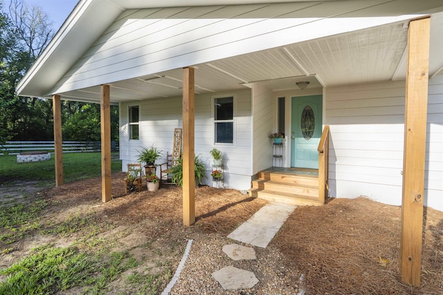 6611 Crooked Creek Rd, Tallahassee, FL 32311 - view of exterior entry featuring a porch