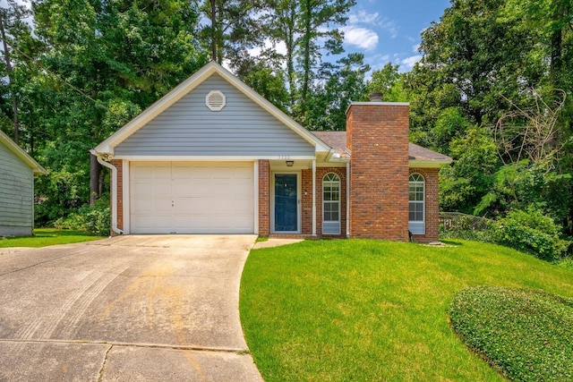 view of front facade featuring a garage and a front lawn