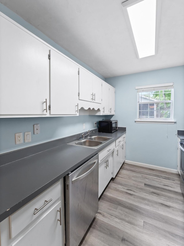 kitchen with dishwasher, light wood-type flooring, white cabinets, and sink