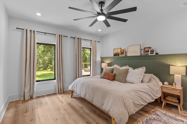 bedroom featuring ceiling fan and light hardwood / wood-style floors