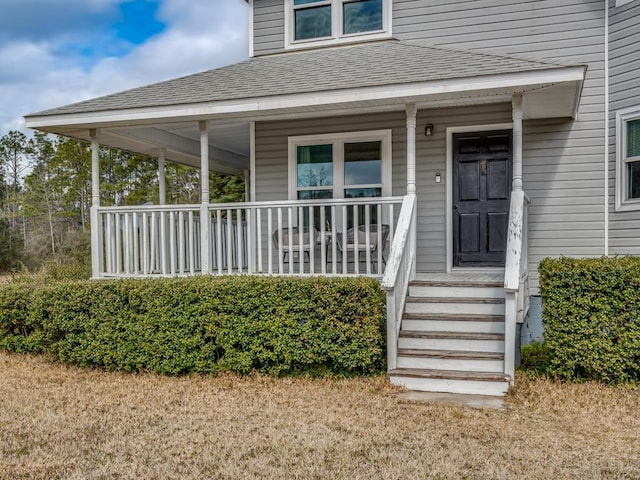 doorway to property with covered porch